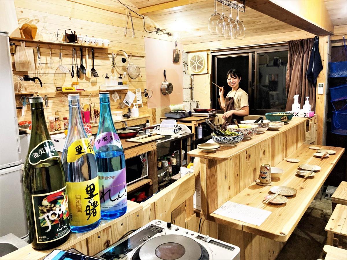 奄美ゲストハウス Hub A Nice Inn Setouchi  ภายนอก รูปภาพ