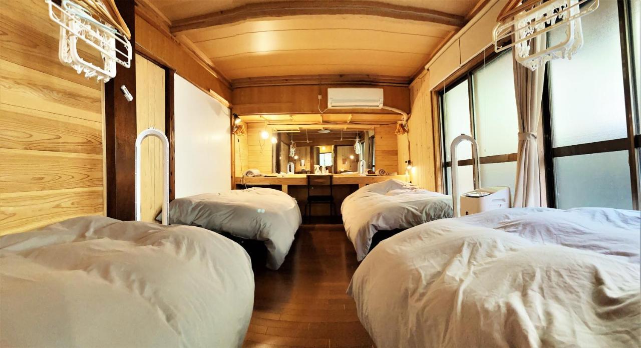 奄美ゲストハウス Hub A Nice Inn Setouchi  ภายนอก รูปภาพ