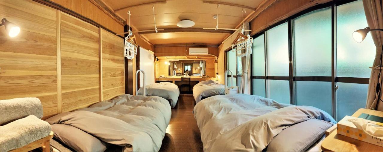 奄美ゲストハウス Hub A Nice Inn Setouchi  ภายนอก รูปภาพ